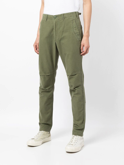 Shop Maharishi Tapered Slim.fit Trousers In Grün