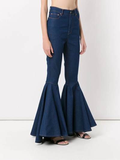 Shop Amapô Denim Flared Trousers In Azul