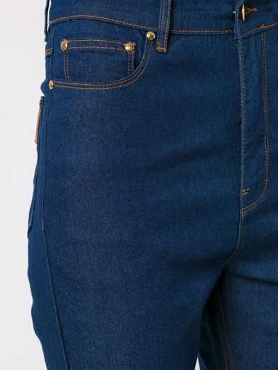 Shop Amapô Denim Flared Trousers In Azul