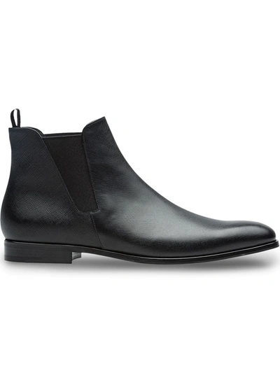 Shop Prada Saffiano Leather Chelsea Boots In Black