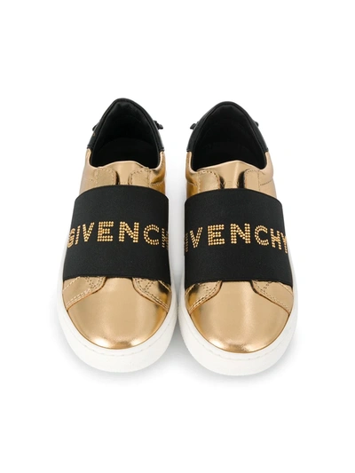 Shop Givenchy Metallic Logo Sneakers In Gold