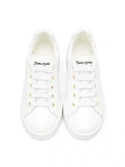 Shop Dolce & Gabbana Portofino Patent Leather Sneakers In White