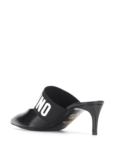 Shop Moschino Logo Strap Mules In Black