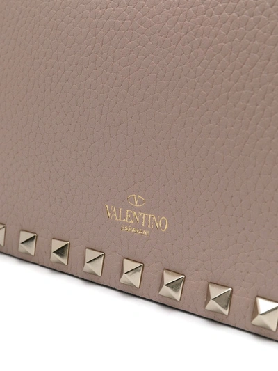 Shop Valentino Rockstud Chain Clutch In Pink