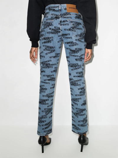 Shop Vetements Logo Print Straight-leg Jeans In Blue