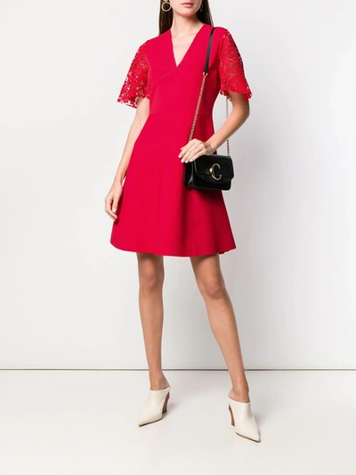 Shop Valentino Lace Sleeve Dress In Red