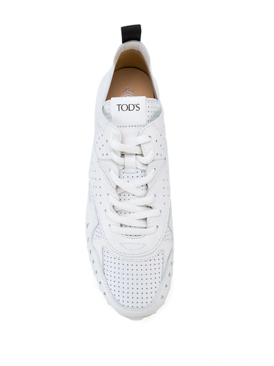 Shop Tod's Perforated Low-top Sneakers In White