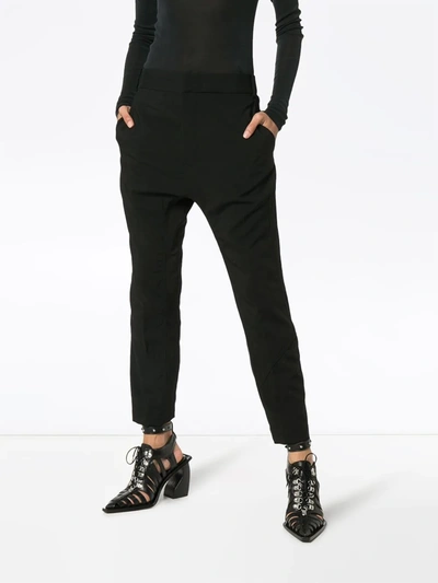 Shop Haider Ackermann Low-rise Slim Trousers In Black