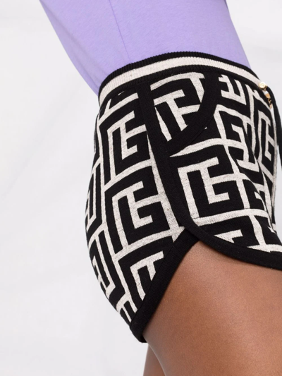 Shop Balmain Monogram-pattern Knitted Shorts In Schwarz