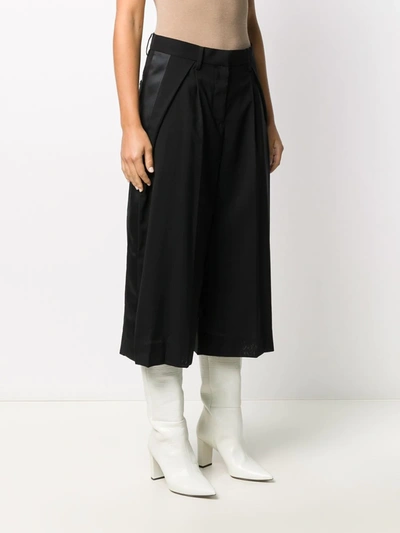 Shop Sacai Stripe-side Culottes In Black