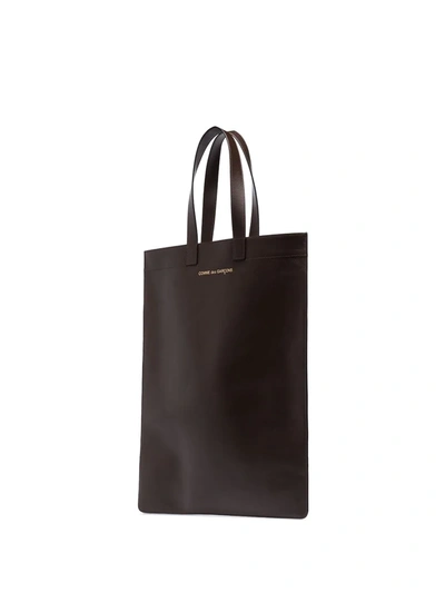 Shop Comme Des Garçons Logo-print Leather Tote Bag In Brown