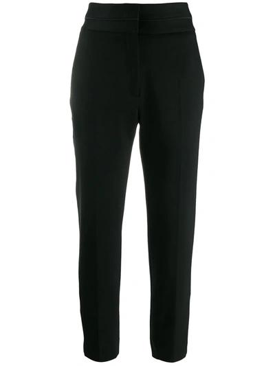 Shop Sandro High-waisted Trousers In Black