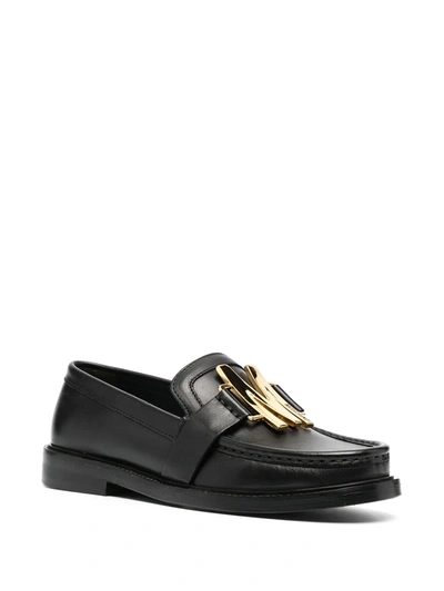 Shop Moschino M Plaque Loafers In Black