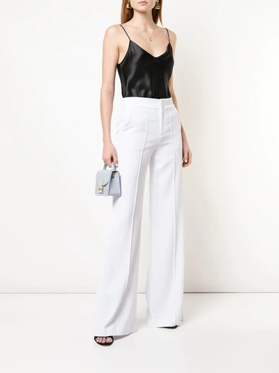 Shop Alice And Olivia High-waist Slim-fit Trousers In White