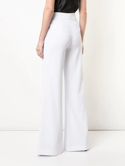 Shop Alice And Olivia High-waist Slim-fit Trousers In White