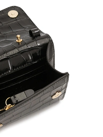 Shop Msgm M Crocodile-embossed Mini Crossbody Bag In Black