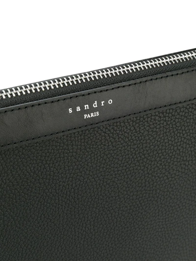 Shop Sandro Logo-stamp Grained Clutch In Black