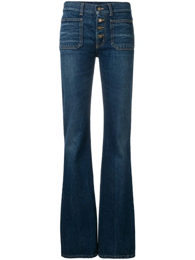 Shop Saint Laurent Mid-rised Bootcut Jeans In Blue