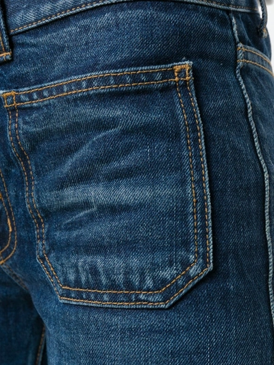 Shop Saint Laurent Mid-rised Bootcut Jeans In Blue