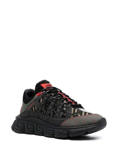 Shop Versace Trigreca Panelled Cut-out Sneakers In Schwarz