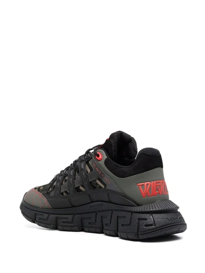 Shop Versace Trigreca Panelled Cut-out Sneakers In Schwarz