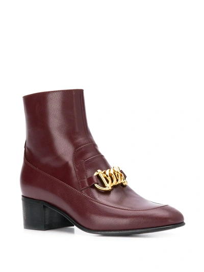 Shop Gucci Horsebit Chain Ankle Boots In Red