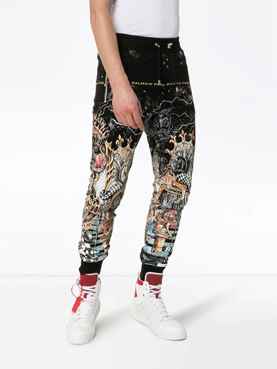 Shop Balmain Dangerous Printed Sweatpants In Black