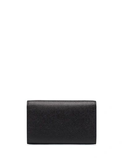 Shop Saint Laurent Monogram Envelope Bag In Black