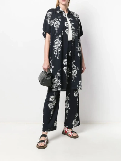 Shop Mcq By Alexander Mcqueen Floral Printed Trousers In Black