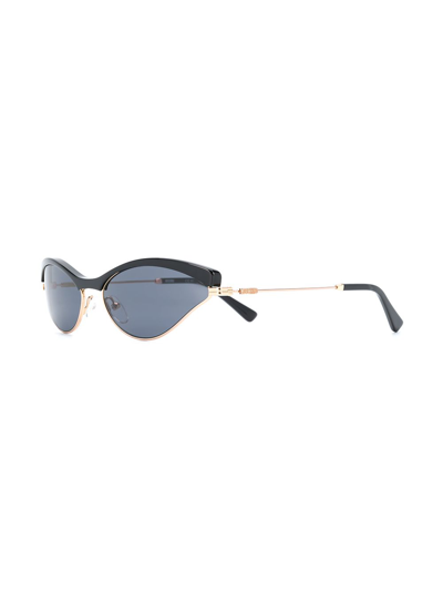 Shop Moschino Eyewear Cat Eye Frame Sunglasses In Black