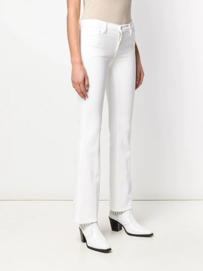 Shop J Brand Low-rise Bootcut Trousers In White