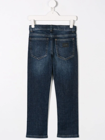 Shop Dolce & Gabbana Logo-appliqué Slim-cut Jeans In Blue