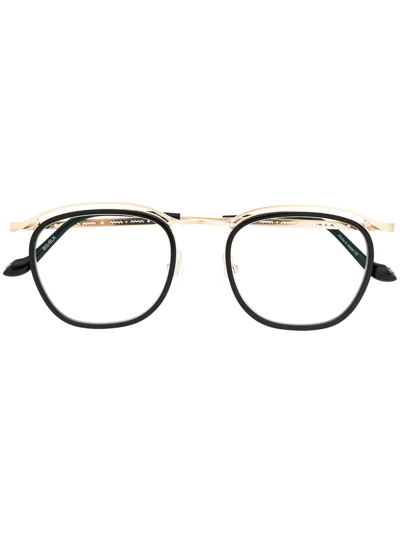 Shop Matsuda Round-frame Glasses In Black