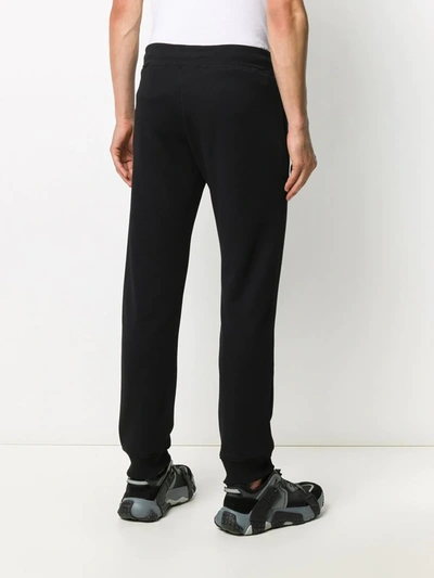 Shop Moschino Double Question Mark Track Pants In Black