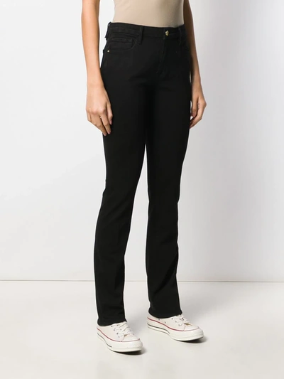 Shop Frame Sylvie Slender High-rise Straight Jeans In Black