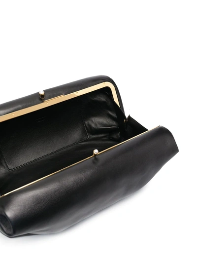 Shop Jil Sander Padded Design Clutch Bag In Black