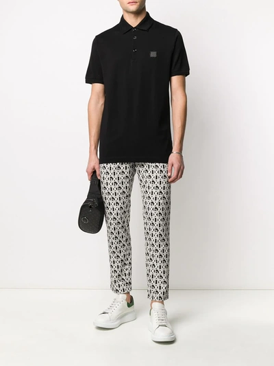Shop Dolce & Gabbana Dg Patch Polo Shirt In Black