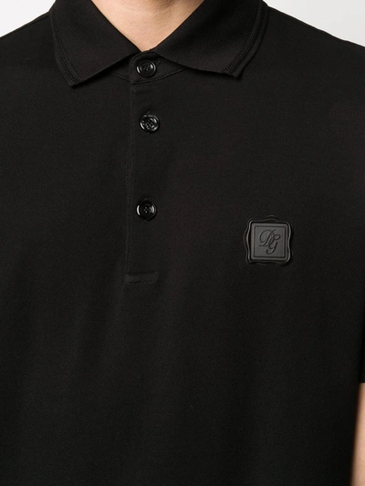 Shop Dolce & Gabbana Dg Patch Polo Shirt In Black