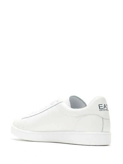 Shop Ea7 Embossed Logo Sneakers In White