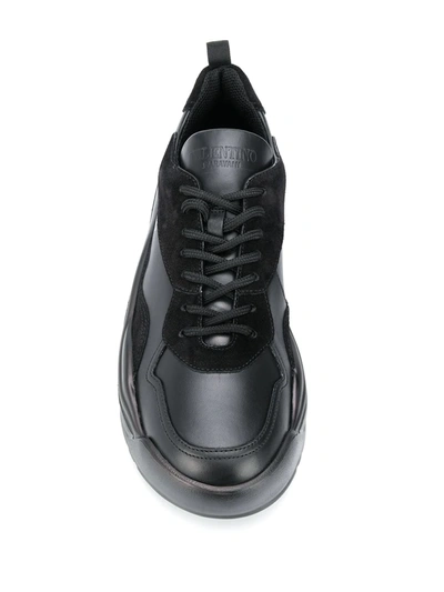 Shop Valentino Gumboy Leather Sneakers In Black