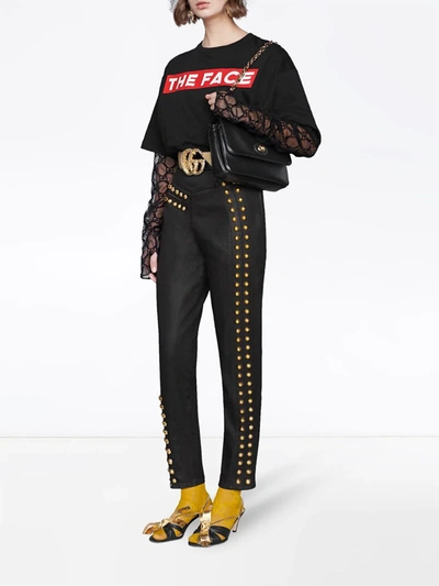 Shop Gucci Gold Tone Logo Bag In Black