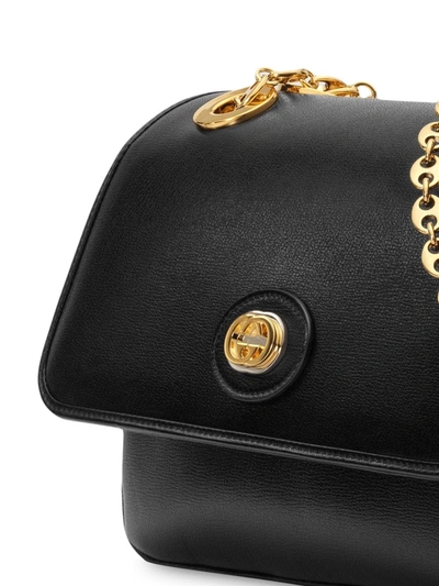 Shop Gucci Gold Tone Logo Bag In Black