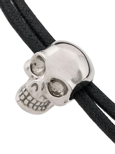 Shop Alexander Mcqueen Woven Skull Bracelet In Black