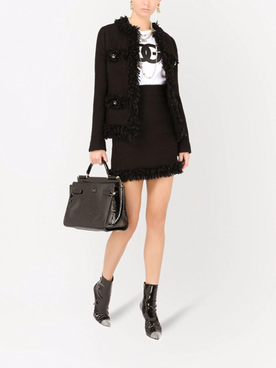Shop Dolce & Gabbana Frayed Bouclé Miniskirt In Schwarz