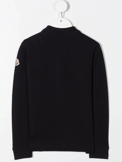 Shop Moncler Long Sleeve Embossed Logo Polo Shirt In Blue