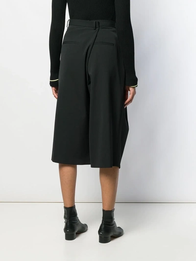 Shop Maison Margiela Asymmetric Cropped Trousers In Black