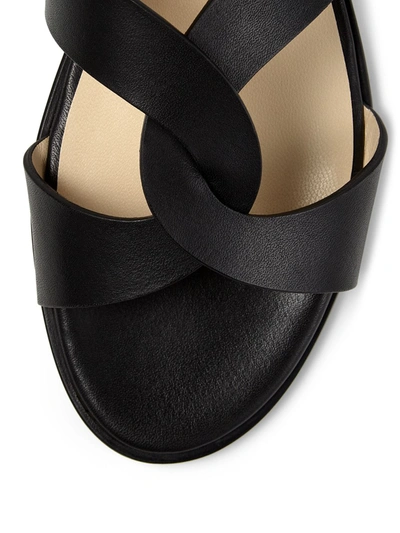 Shop Jimmy Choo Atia Flat Crossover Strap Sandals In Black