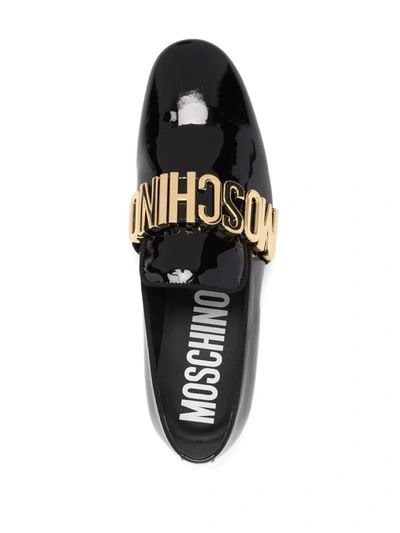 Shop Moschino Logo-plaque Glossy Loafers In Schwarz