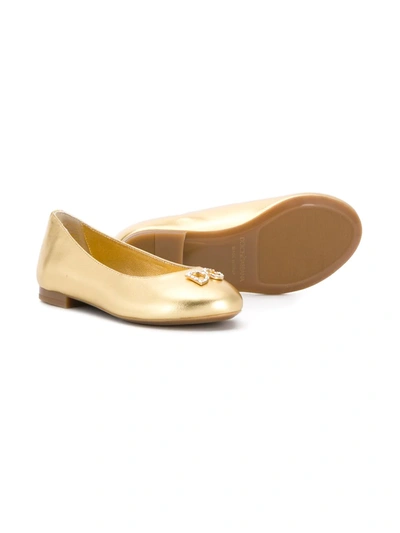 Shop Dolce & Gabbana Logo Embellished Ballerinas In Gold