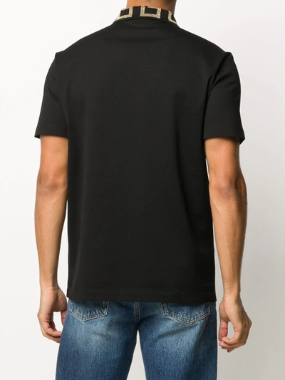 Shop Versace Greca Collar Polo Shirt In Black